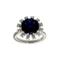 Rhodium Plated 925 Sterling Silver Blue Center Flower CZ Ring with Rope Band - BGR01302BLU | Silver Palace Inc.